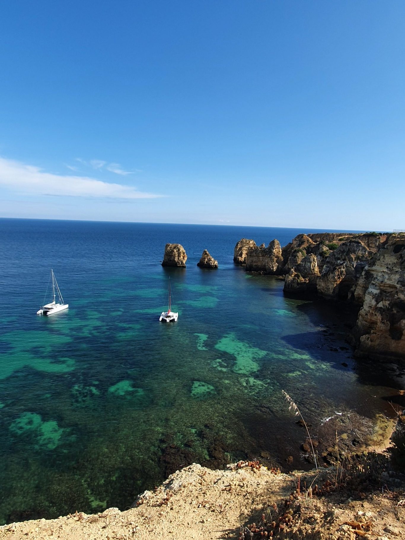 Iconic Rock Formations of Ponta da Piedade Discover the breathtaking beauty of Ponta da Piedade, Algarve, Portugal, with its stunning turquoise waters and dramatic cliffs"